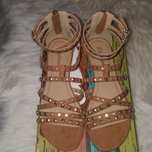 Gold studded gladiator sandals with box.